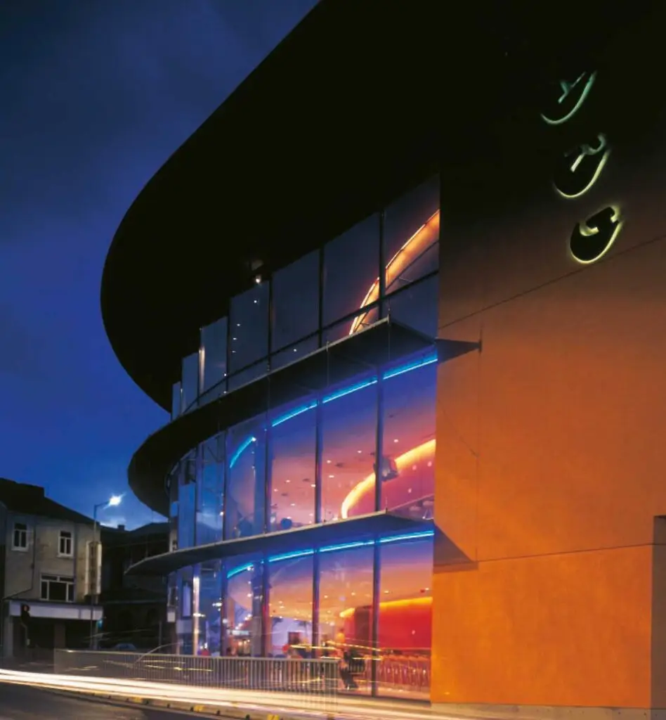 ARC building signage lit up at night