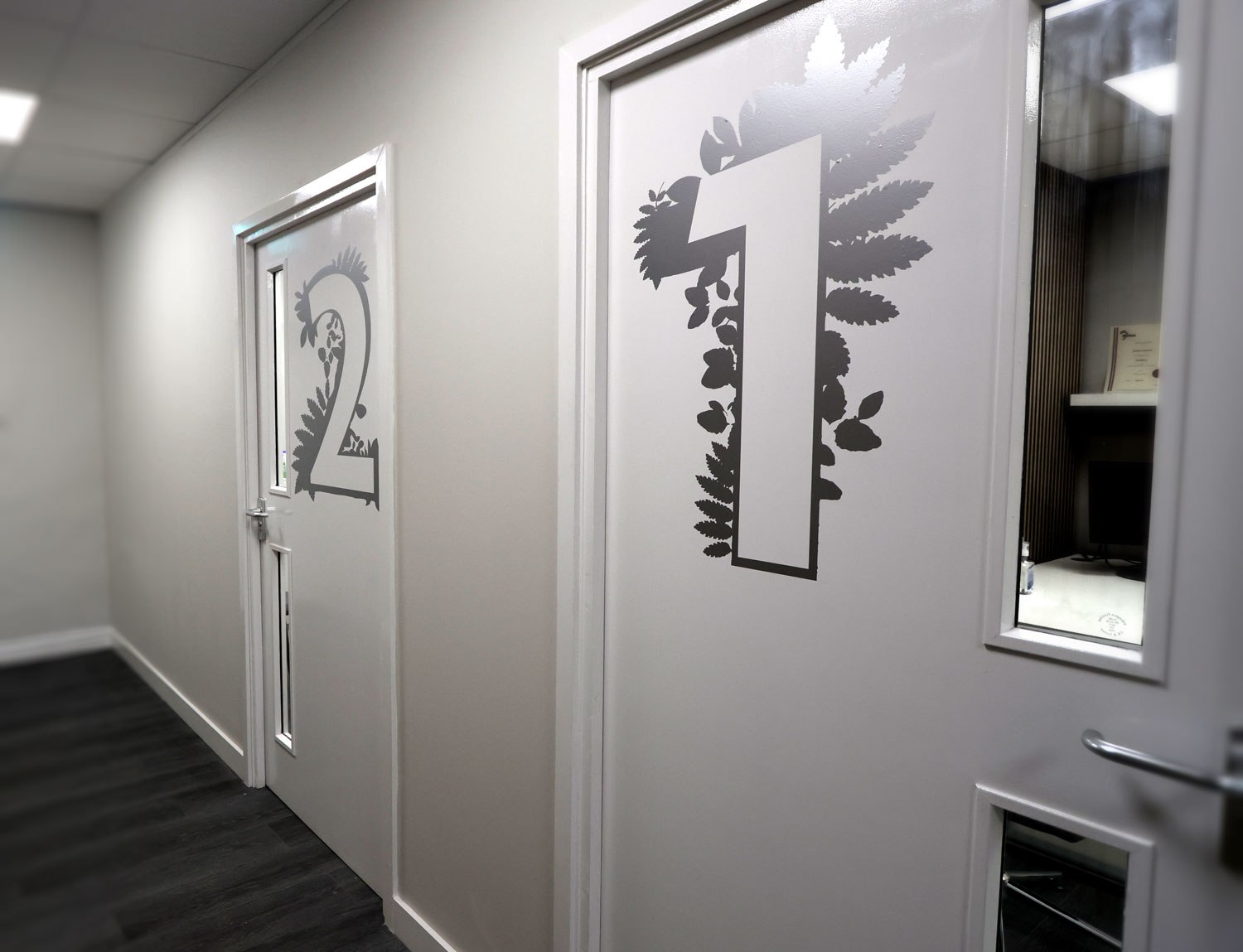 Your Hearing Consultants Examination room door number graphics
