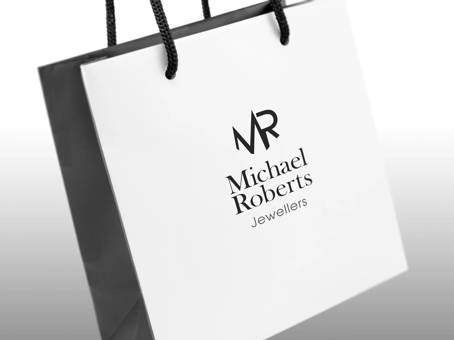 Michael Roberts branded paper bag design